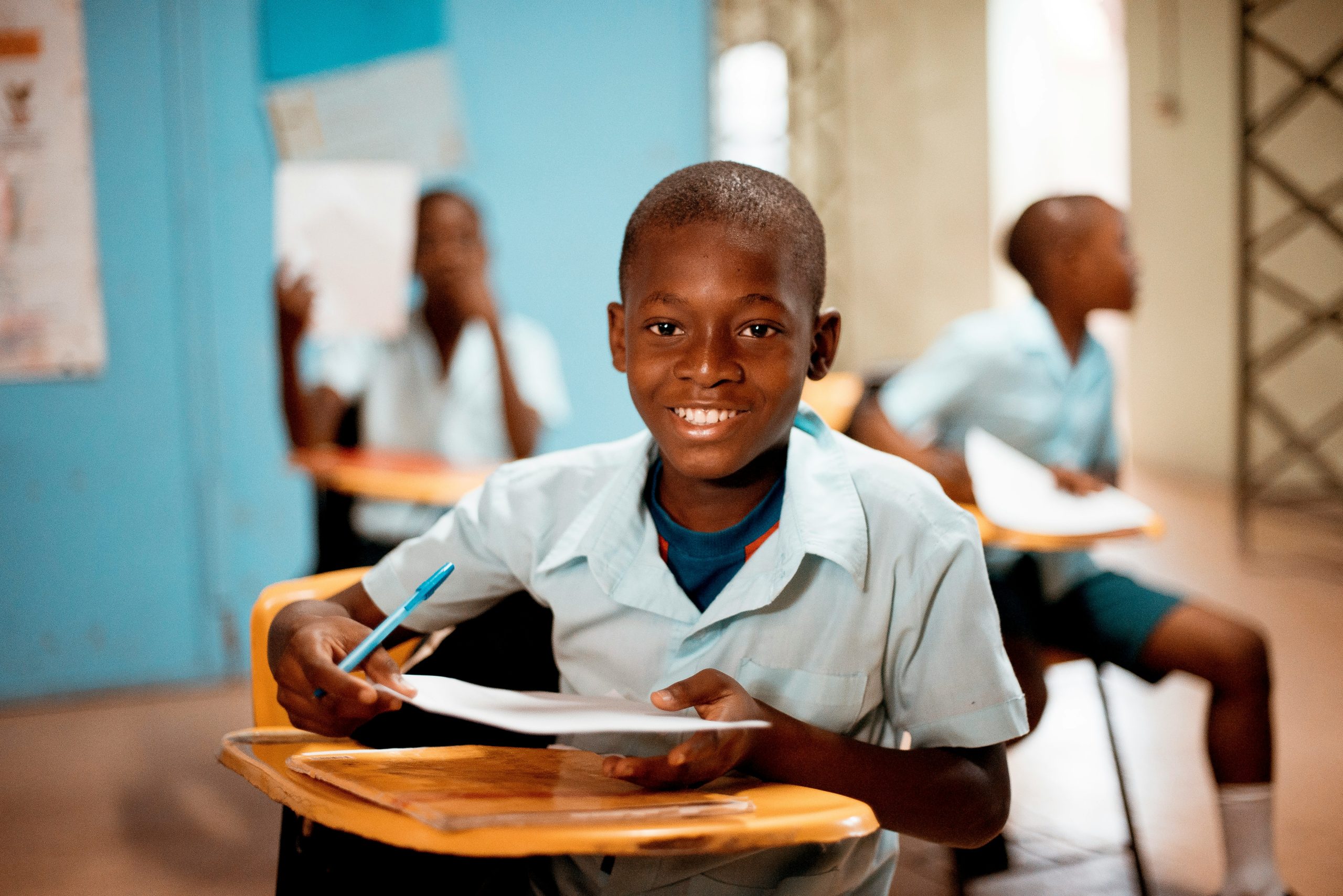 a student sitting on a school desk
